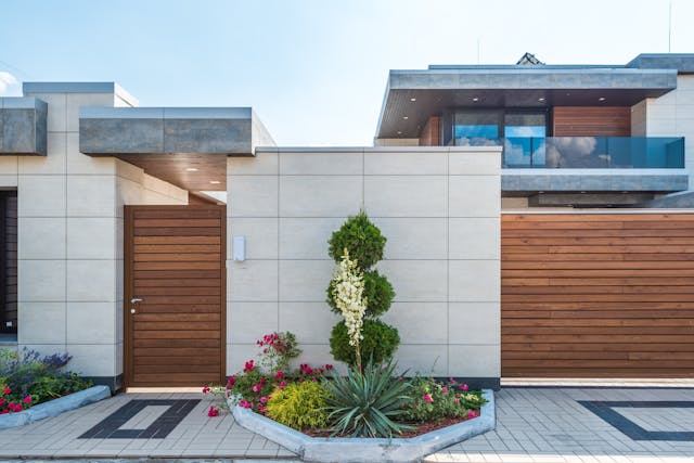 a modern home with fresh landscaping