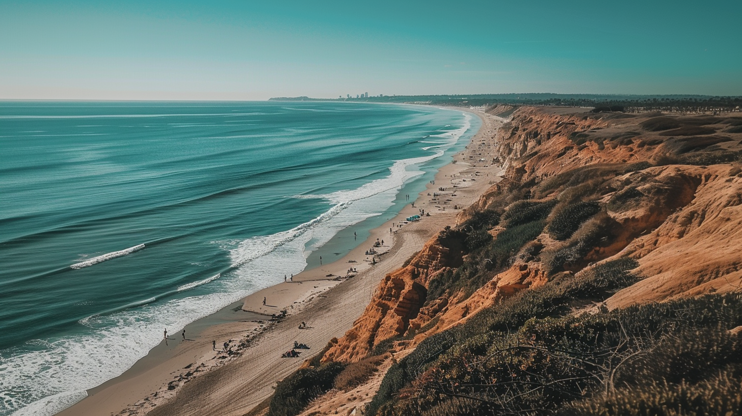 Overlooking from a cliff, the beauty of the San Diego beach shoreline. The best place to live and rent a home.